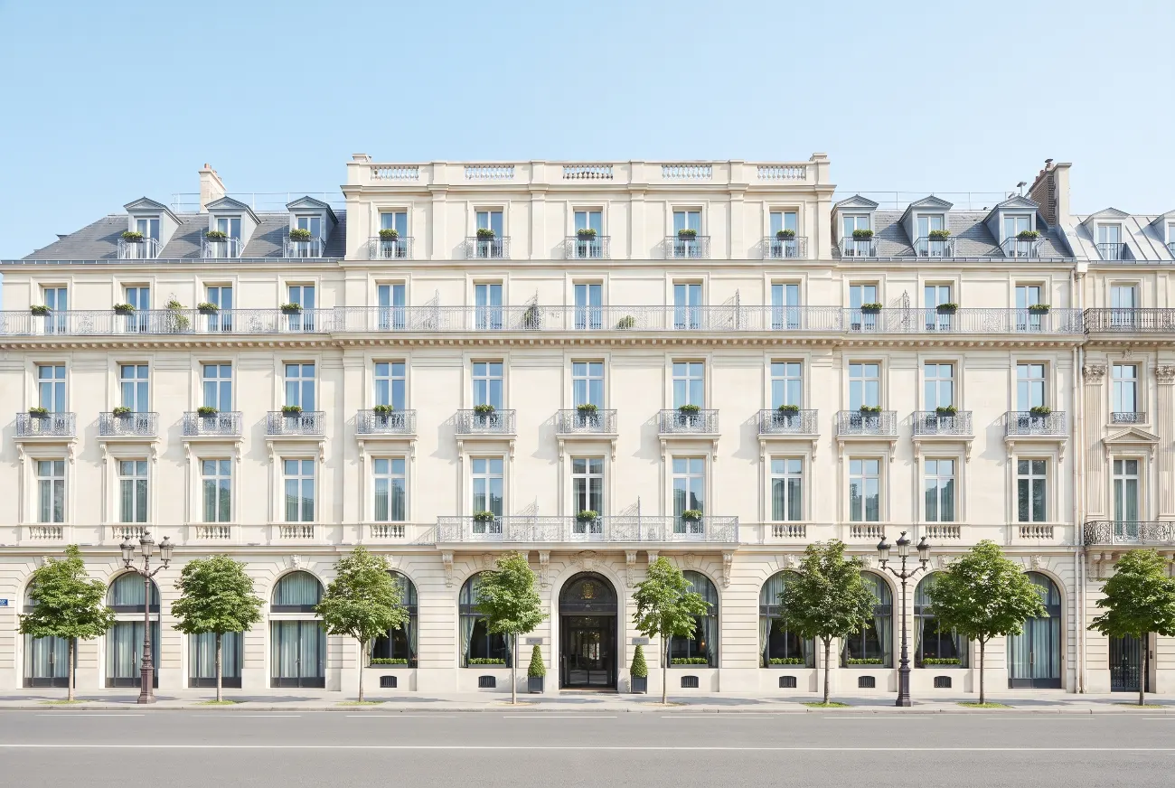 Large Paris hotel exterior seen across a boulevard in clear daylight